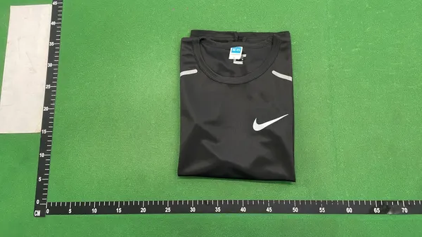 Black Training Tee With Reflective Chest Logo — warehouse QC photo 4