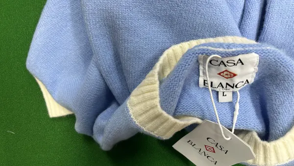 Light Blue Crewneck Sweater With Cream Trim — warehouse QC photo 1