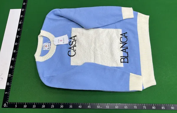 Light Blue Crewneck Sweater With Cream Trim — warehouse QC photo 2