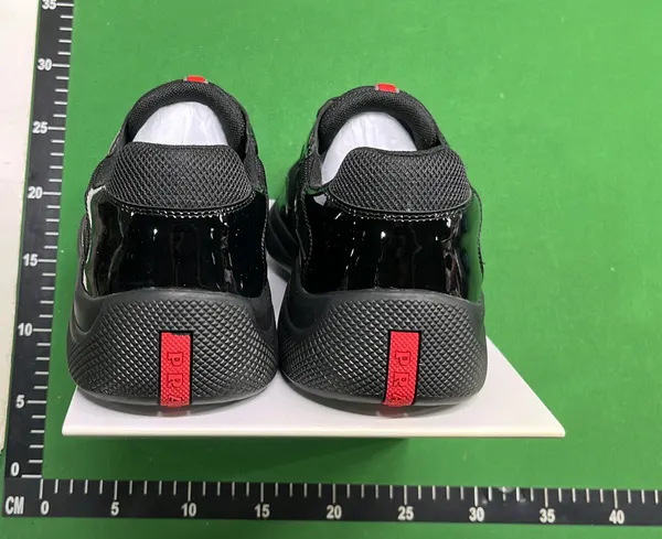 Black Patent Leather Mesh Low-Top Sneakers — warehouse QC photo 3