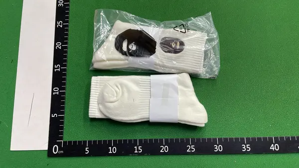 White Ribbed Crew Socks With Embroidered Logo — warehouse QC photo 6