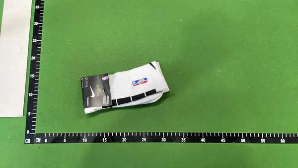 White Ribbed Crew Socks With Black Stripes — warehouse QC photo 1