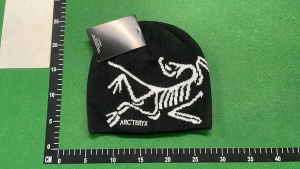 Ribbed Cuffed Beanie With Jacquard Lettering — warehouse QC photo 1