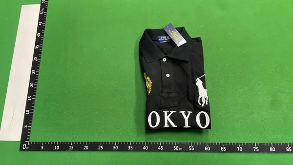 Black Polo Shirt With City Name Print — warehouse QC photo 4