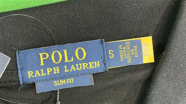 Black Polo Shirt With City Name Print — warehouse QC photo 5