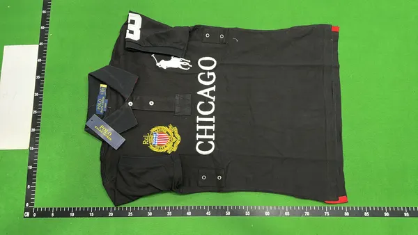 Black Polo Shirt With City Name Print — warehouse QC photo 6