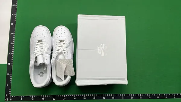 White And Black Leather Low-Top Sneakers — warehouse QC photo 1