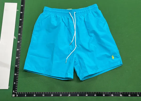 Light Blue Drawstring Beach Shorts — warehouse QC photo 2
