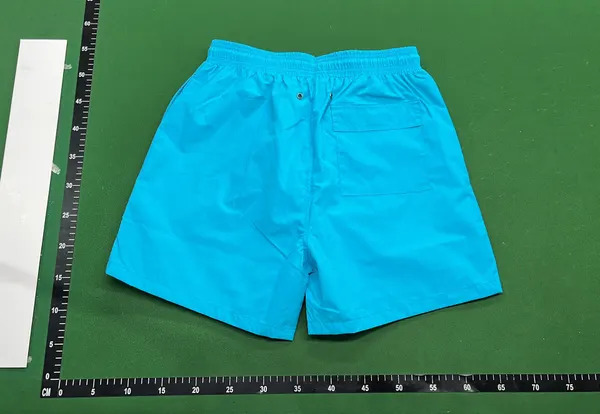 Light Blue Drawstring Beach Shorts — warehouse QC photo 3