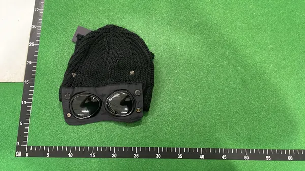 Ribbed Knit Beanie With Goggle Lens Detail — warehouse QC photo 3