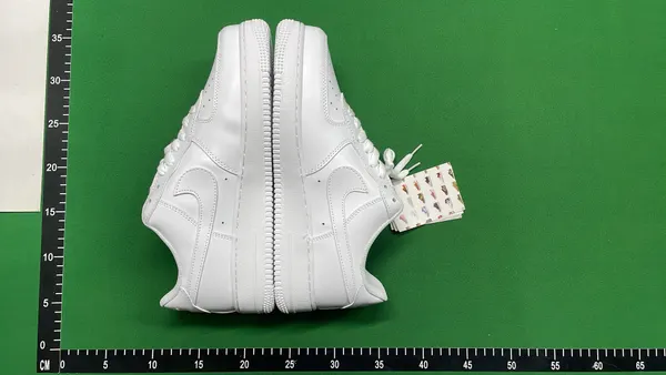 White And Black Leather Low-Top Sneakers (#4) — warehouse QC photo 4