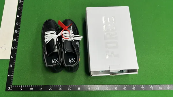 Black Leather Low-Top Sneakers With Zip Tie — warehouse QC photo 1