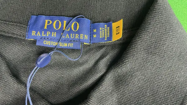 Black Pique Knit Polo Shirt — warehouse QC photo 1
