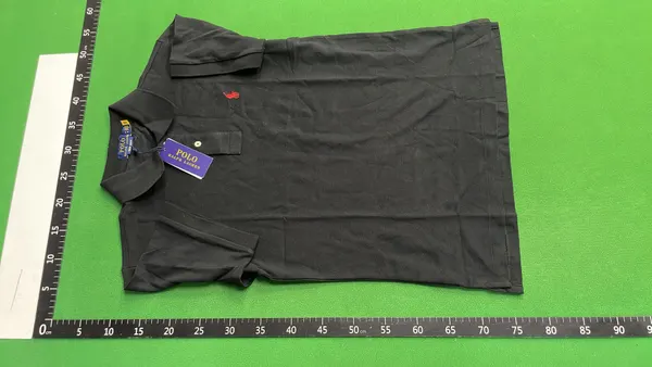 Black Pique Knit Polo Shirt — warehouse QC photo 2