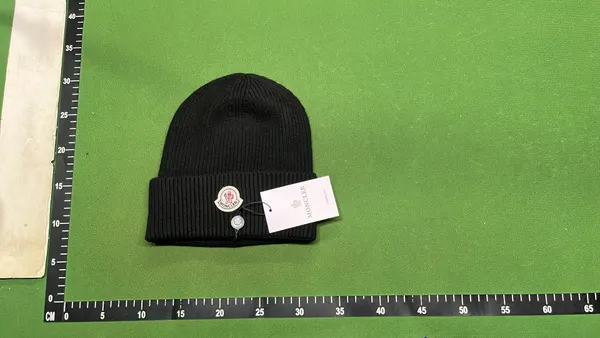 Ribbed Knit Beanie With Oval Patch Badge — warehouse QC photo 1