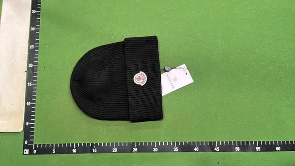 Ribbed Knit Beanie With Oval Patch Badge — warehouse QC photo 3