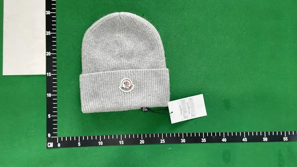 Ribbed Knit Beanie With Oval Patch Badge — warehouse QC photo 4