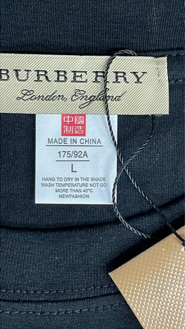 Black Crewneck Tee With Small Chest Print — warehouse QC photo 1