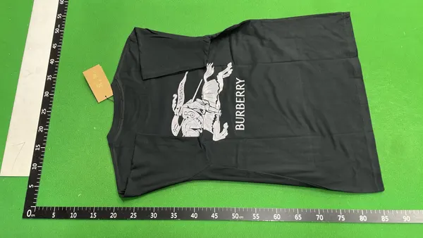 Black Crewneck Tee With Small Chest Print — warehouse QC photo 3