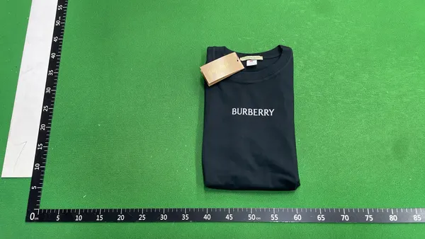 Black Crewneck Tee With Small Chest Print — warehouse QC photo 4