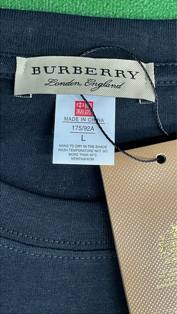 Black Crewneck Tee With Small Chest Print — warehouse QC photo 5