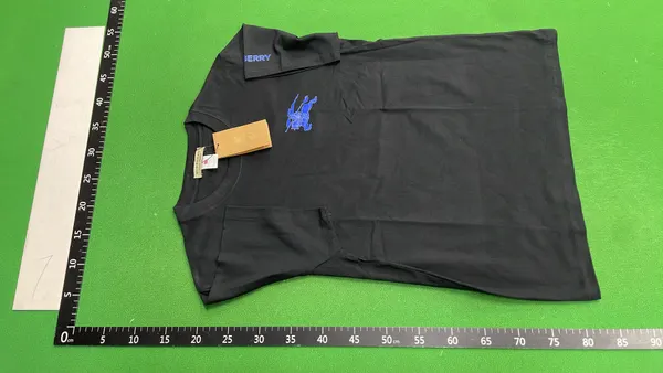 Black Crewneck Tee With Small Chest Print — warehouse QC photo 6