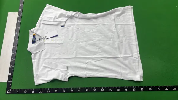Black Polo Shirt With Number Sleeve Print — warehouse QC photo 2