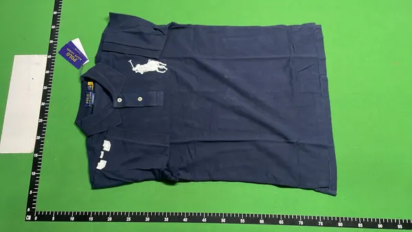 Black Polo Shirt With Number Sleeve Print — warehouse QC photo 6