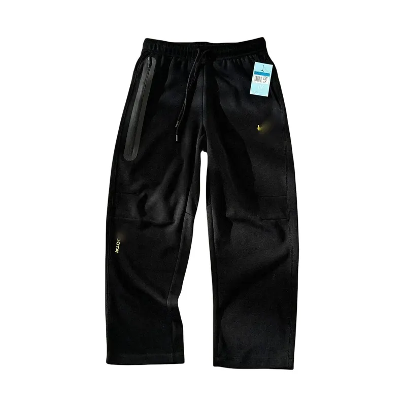 Black Drawstring Track Pants With Zip Pocket — merchant catalogue photo