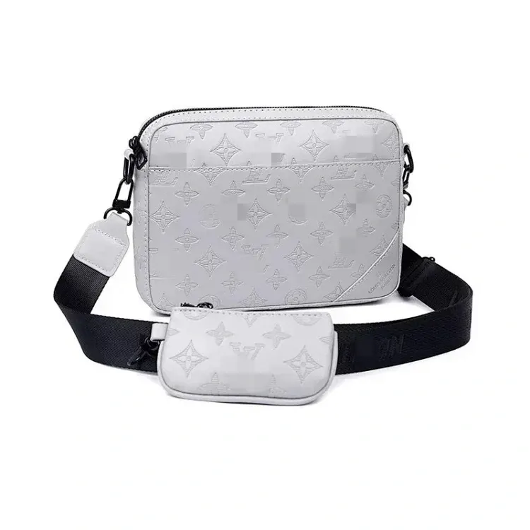 White Embossed Monogram Crossbody Bag With Pouch — merchant catalogue photo