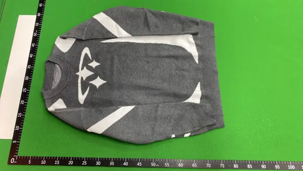 Cream Knit Sweater With Black Star Intarsia — warehouse QC photo 2