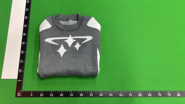 Cream Knit Sweater With Black Star Intarsia — warehouse QC photo 4