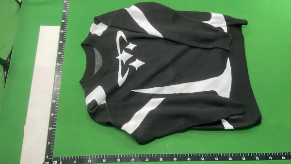 Cream Knit Sweater With Black Star Intarsia — warehouse QC photo 6