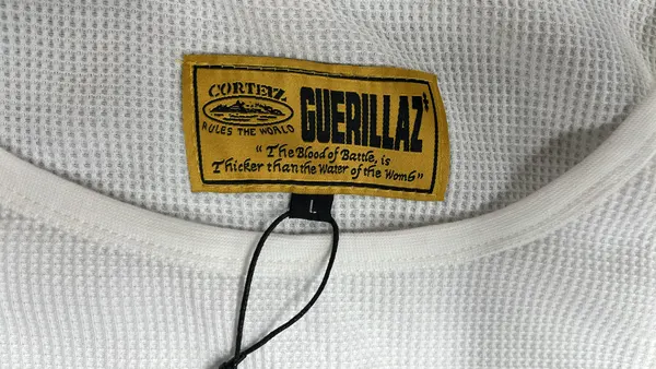 White Ribbed Tank Top With Script Embroidery — warehouse QC photo 1