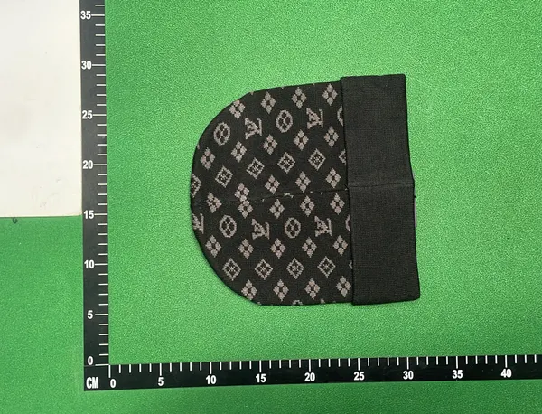 Allover Print Cuffed Knit Beanie — warehouse QC photo 3