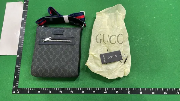 Black Monogram Crossbody Bag With Striped Strap — warehouse QC photo 3