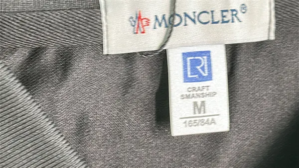 Black Polo Shirt With Striped Collar Trim — warehouse QC photo 1