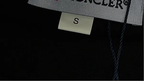 White Tee With Tonal Embossed Chest Lettering — warehouse QC photo 1