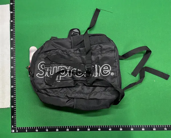 Black Nylon Backpack With Buckle Strap — warehouse QC photo 1