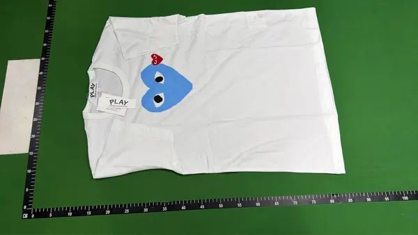 White T-Shirt With Pink Heart Eyes Print — warehouse QC photo 2
