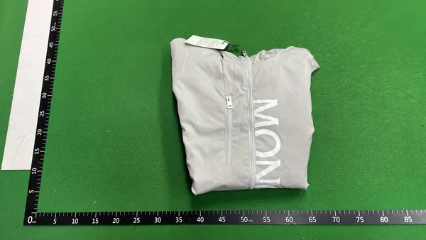 Black Hooded Shell Jacket With Vertical Text Print — warehouse QC photo 4