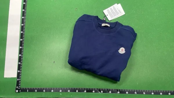Black Crewneck Sweatshirt With Chest Patch — warehouse QC photo 4