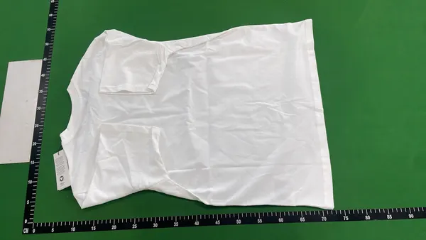 White Boxy T-Shirt With Red Heart Emblem — warehouse QC photo 3