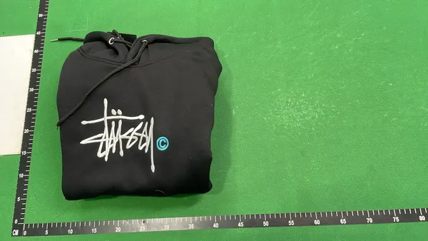 Black Hoodie With White Script Chest Print — warehouse QC photo 4