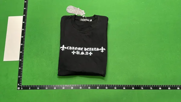 Black Oversized Tee With Tonal Cross Print — warehouse QC photo 4