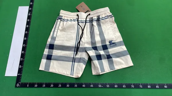 Check And Monogram Print Drawstring Shorts — warehouse QC photo 2