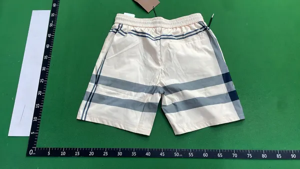 Check And Monogram Print Drawstring Shorts — warehouse QC photo 3