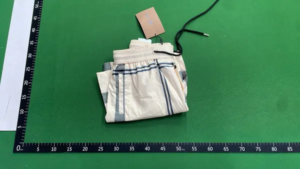 Check And Monogram Print Drawstring Shorts — warehouse QC photo 4