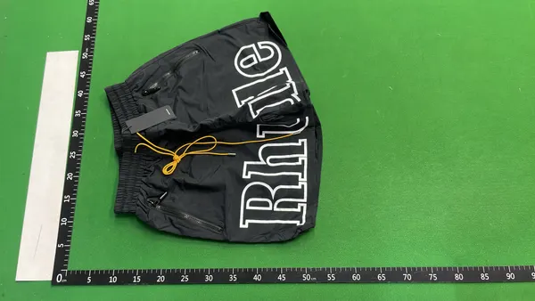 Nylon Shorts With Large Outlined Wordmark Print (Black) — warehouse QC photo 2