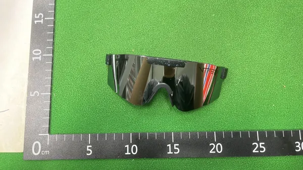 Black Gold Wraparound Shield Sport Sunglasses — warehouse QC photo 1